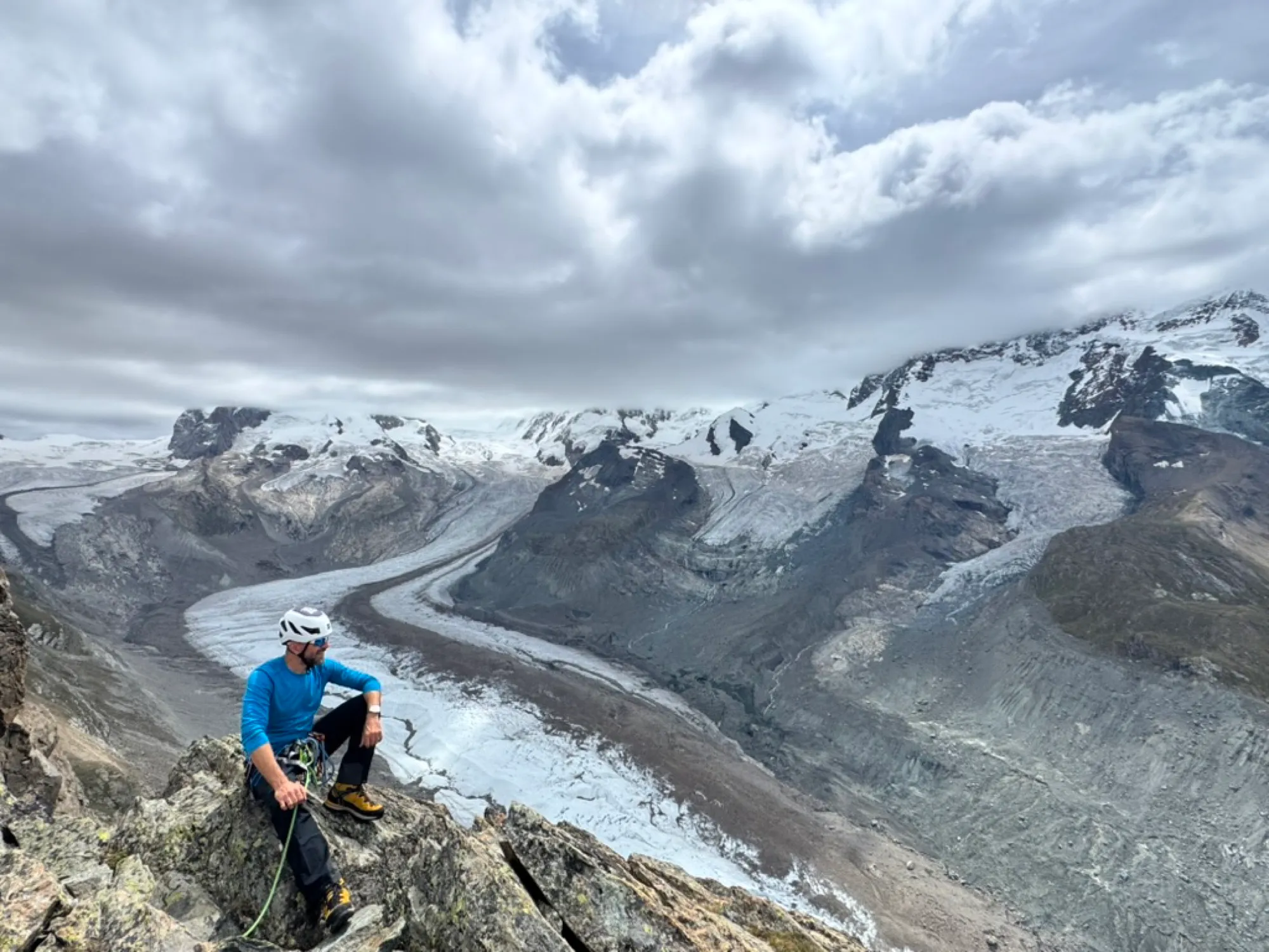 The top of the Riffelhorn, the first real rock of the trip. Boot rubber and faith, and the Gorner glacier pouring away behind.